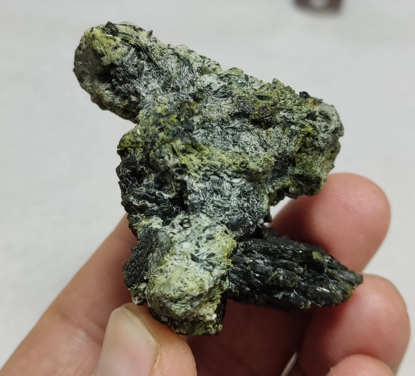 An aesthetic specimen of epidote crystal spray type 66 grams