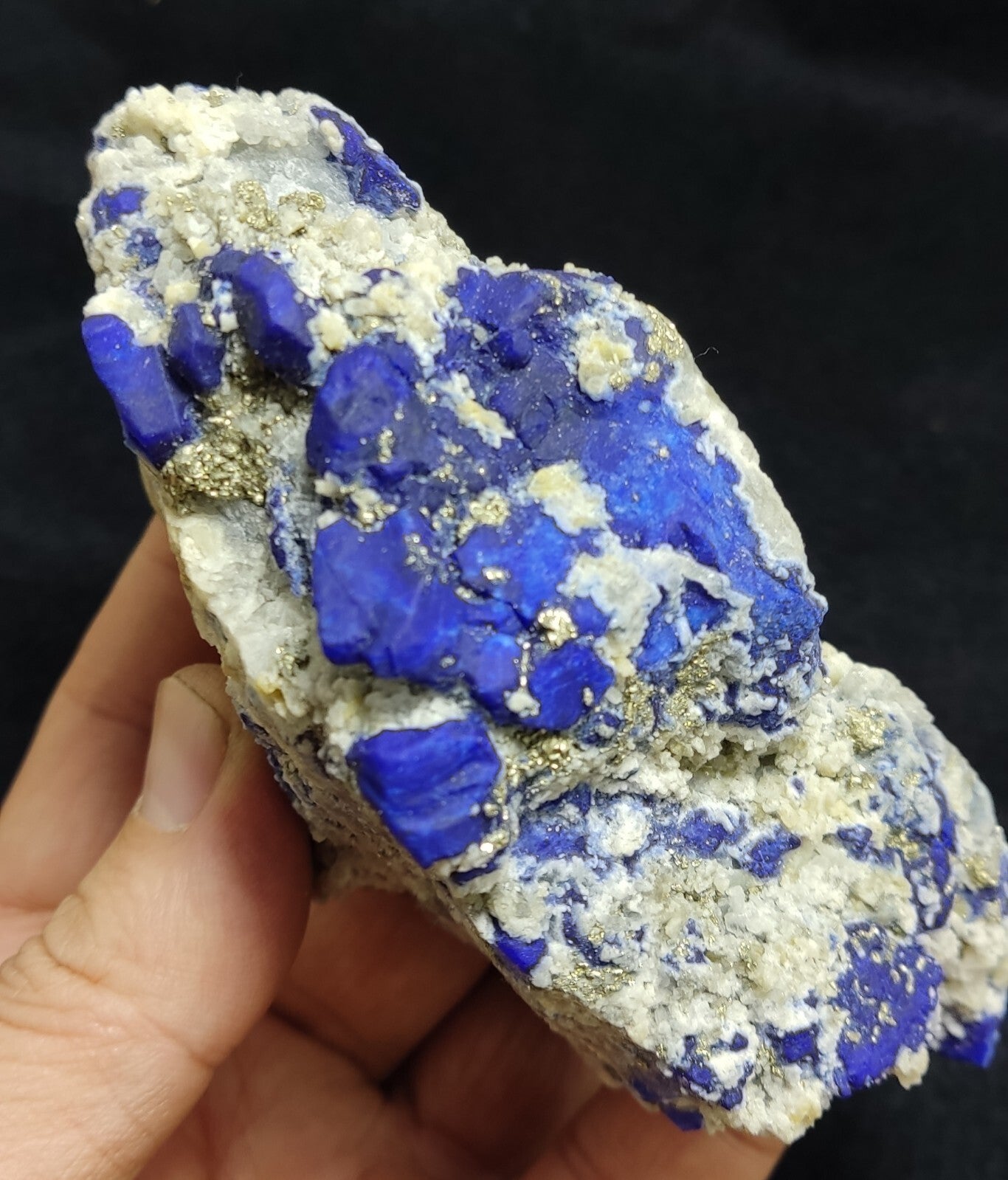 An Aesthetic specimen of fluorescent Lazurite with pyrite 489 grams