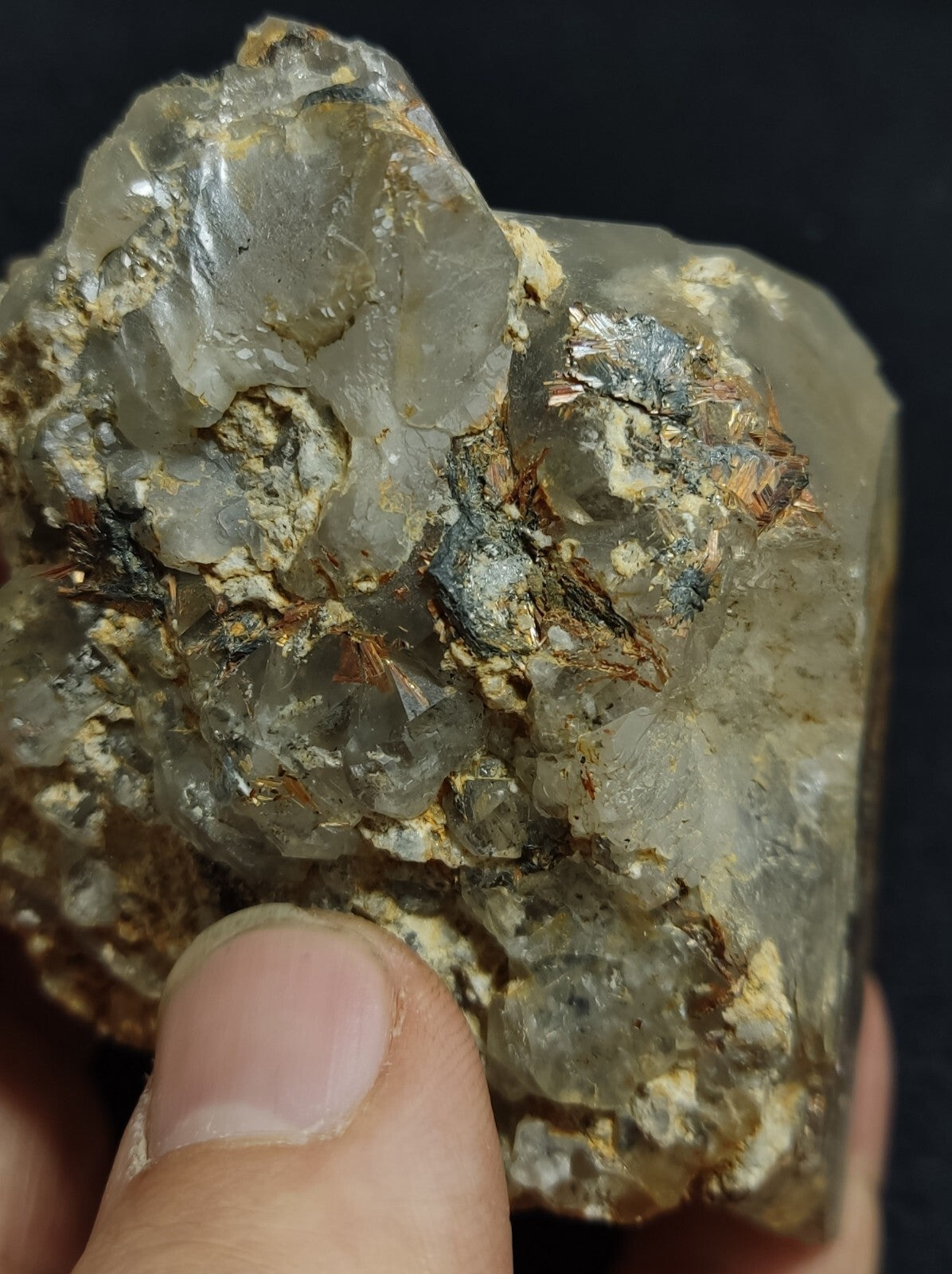 An Aesthetic terminated Quartz floater with rutiles and hematite 399 grams