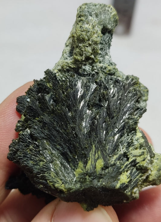 An aesthetic specimen of epidote crystal spray type 66 grams