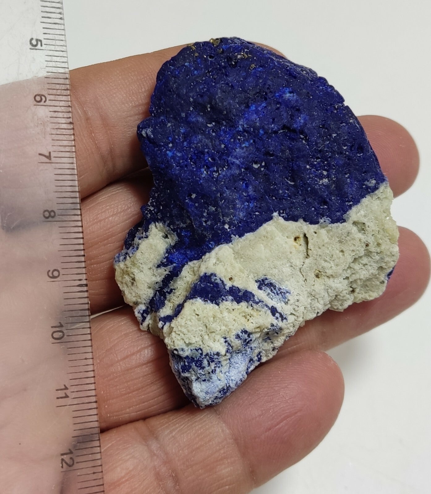 An Aesthetic specimen of fluorescent Lazurite with Pyrite 62 grams