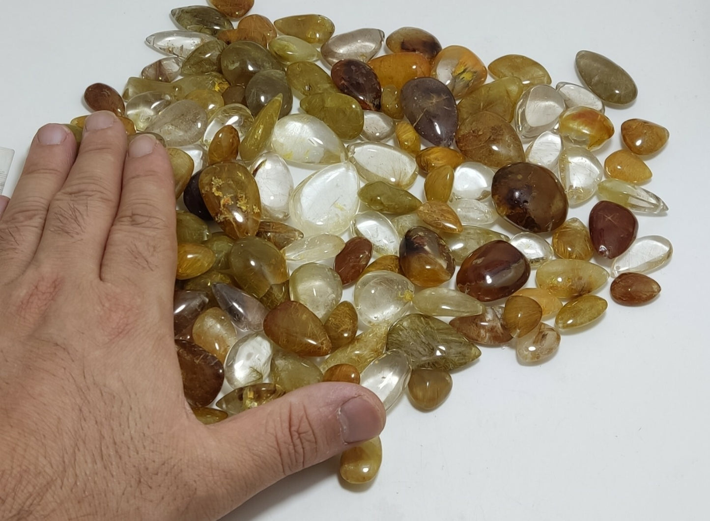 780 grams Rutilated polished quartz tumbles-cabochons