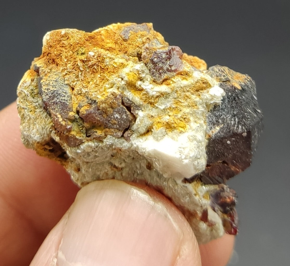 An aesthetic specimen of spessartine garnets on albite/feldspar 15 grams