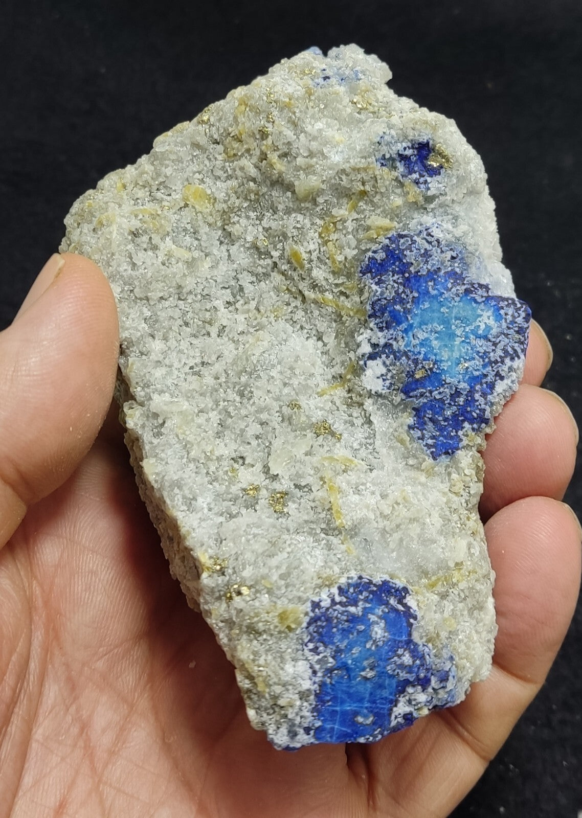 An Aesthetic specimen of fluorescent Lazurite with pyrite 415 grams