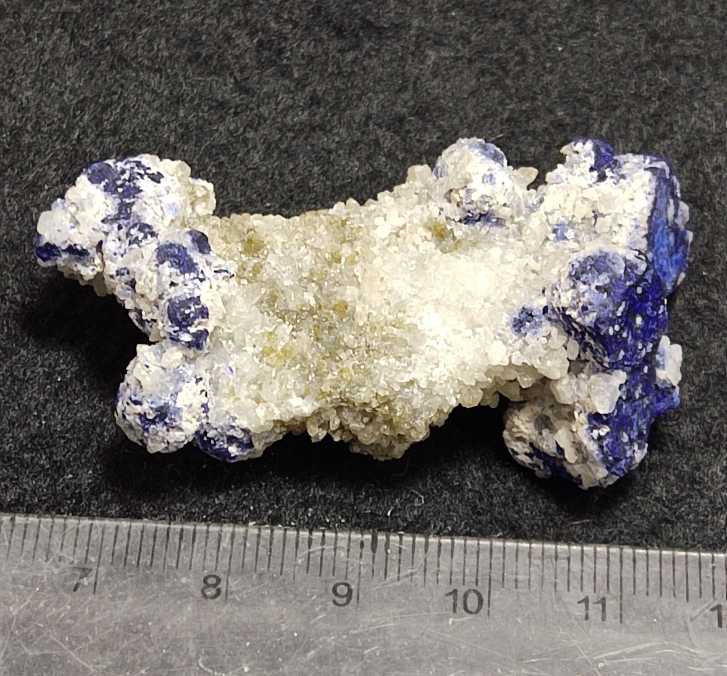 An Aesthetic specimen of fluorescent Lazurite with pyrite 24 grams