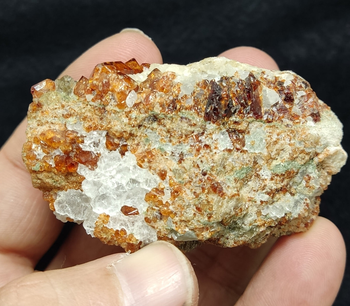 An Aesthetic specimen of hessonite garnets on matrix 132 grams