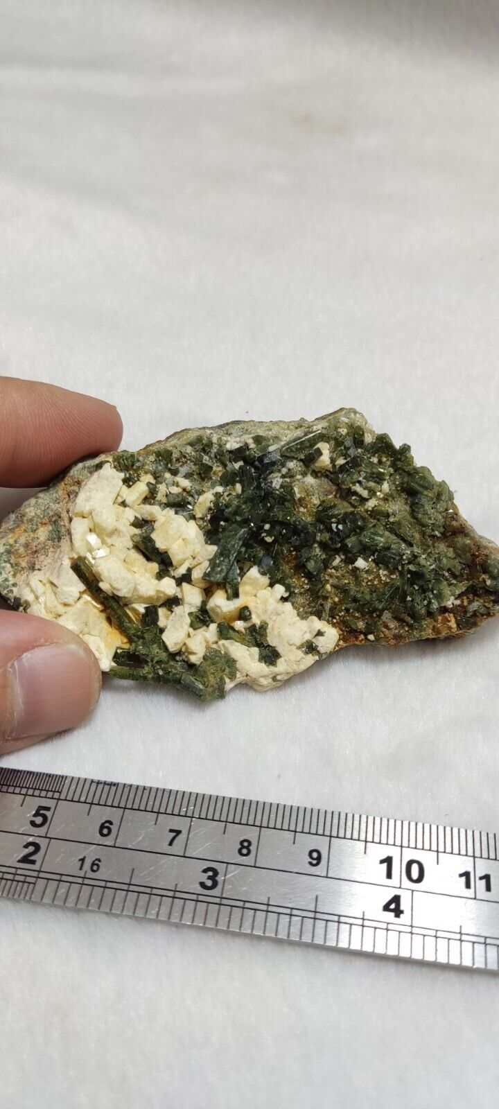 An aesthetic specimen of green color diopside 90 grams