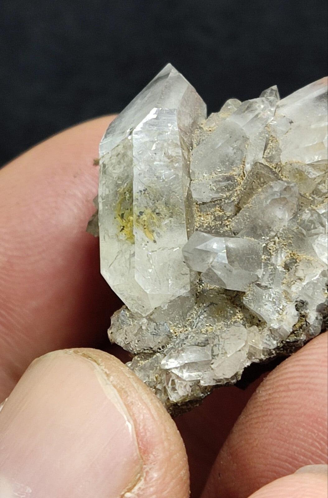 An Aesthetic quartz/calcite crystal specimen with petroleum inclusions 15 grams