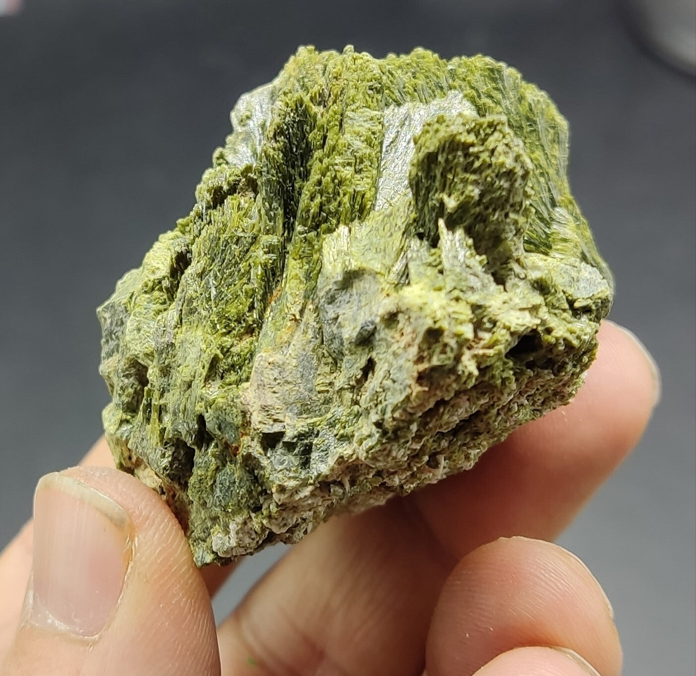 An aesthetic specimen of epidote crystal spray type 107 grams