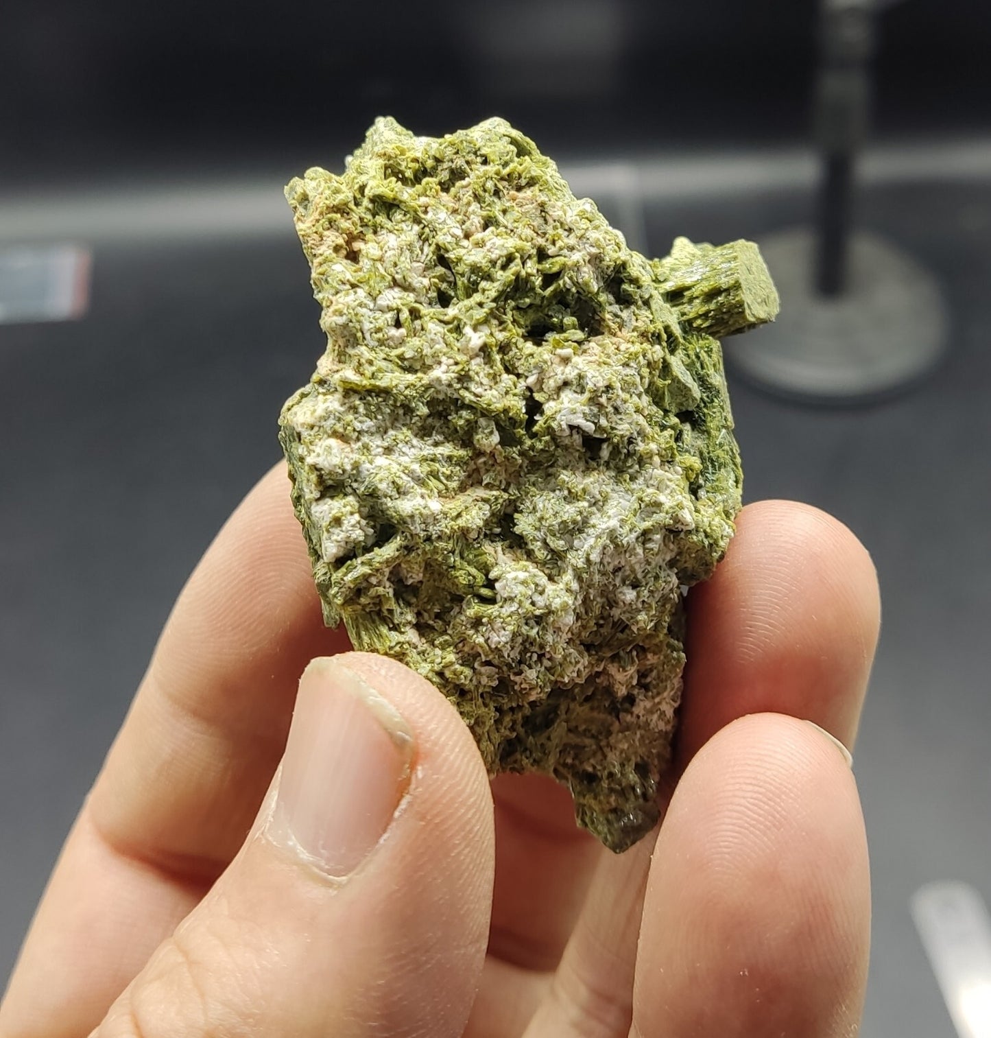 An aesthetic specimen of epidote crystal spray type 107 grams