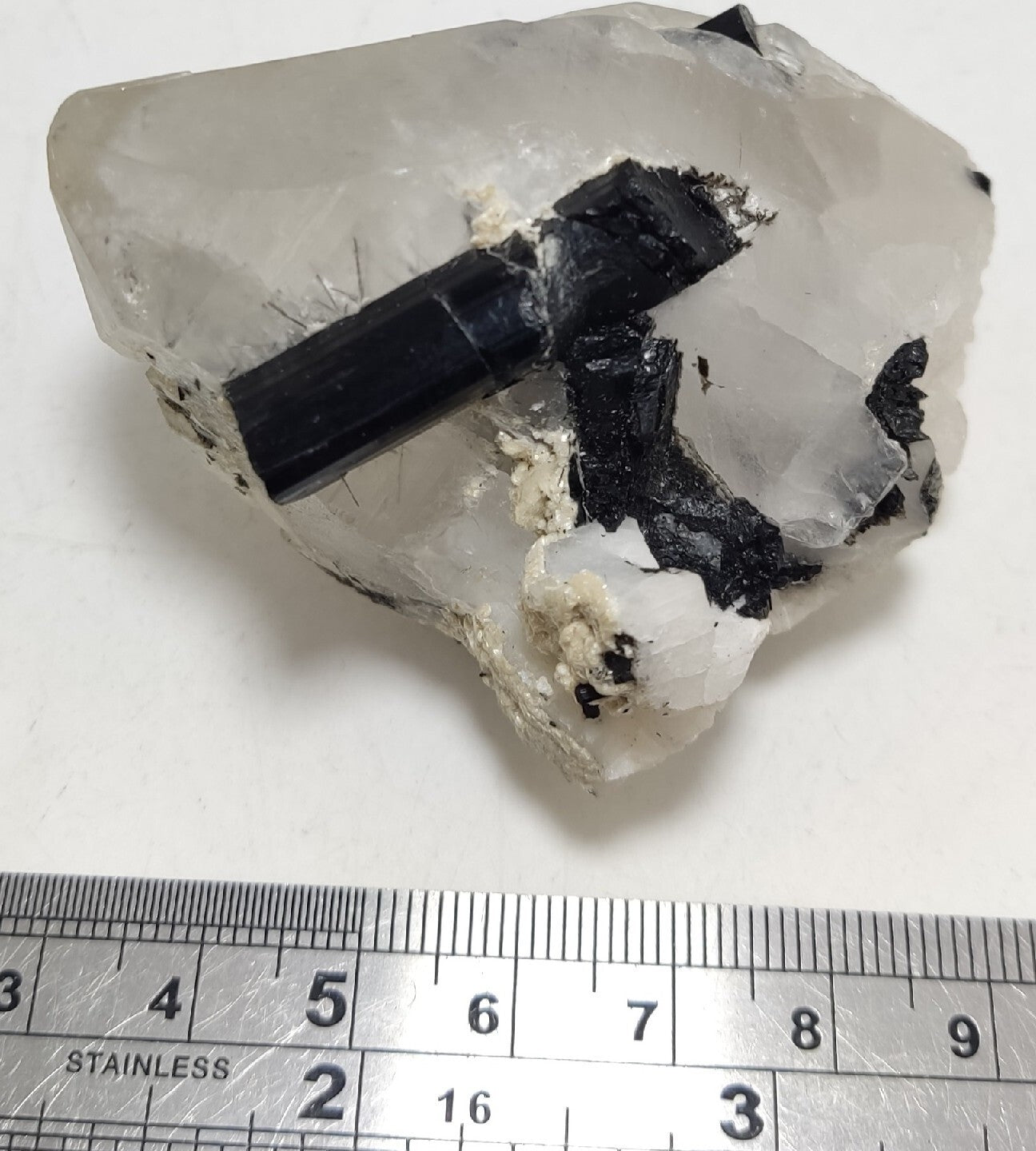 Natural quartz crystal with black tourmaline 129 grams