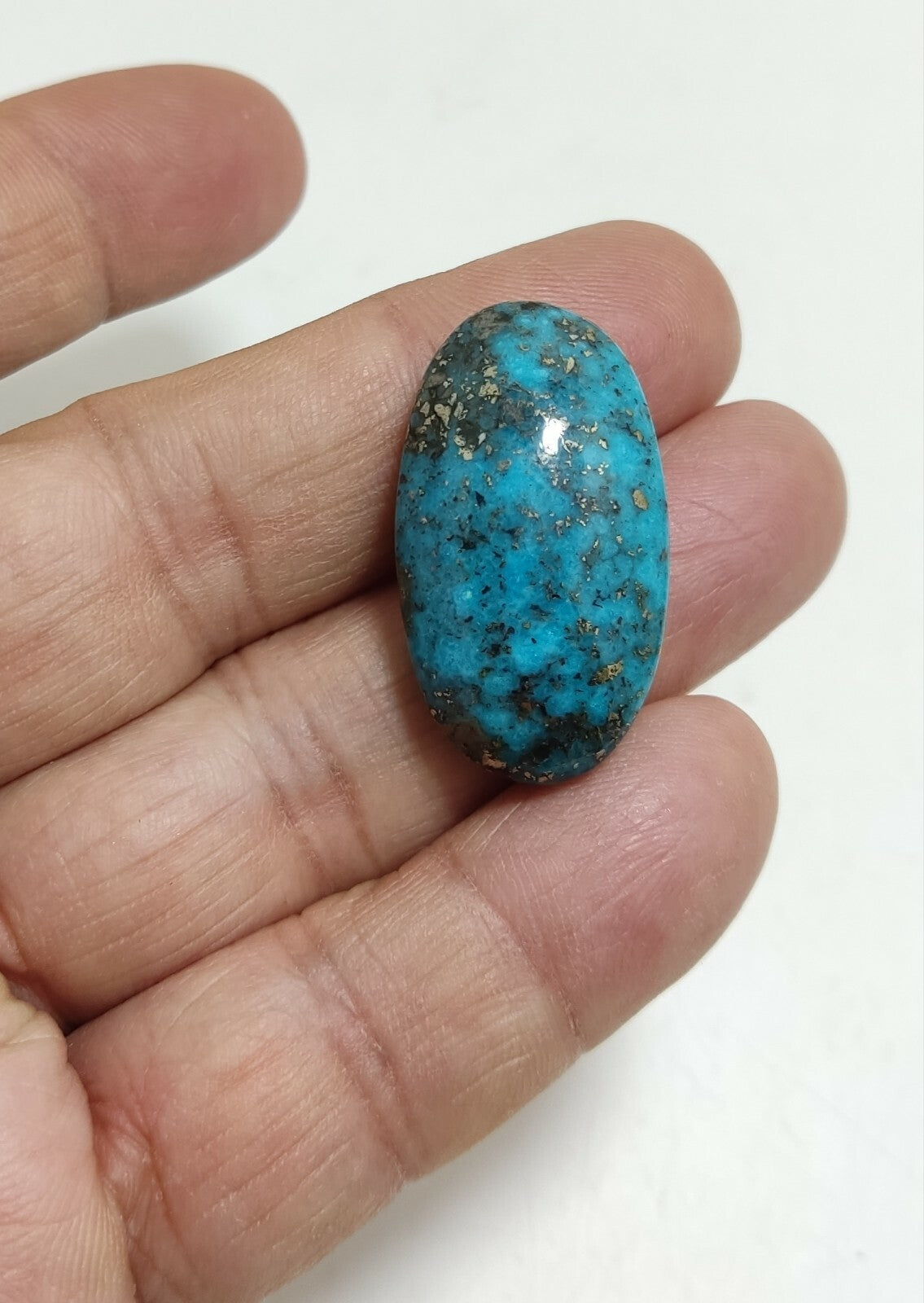 Two turquoise cabochons 22.5 grams both