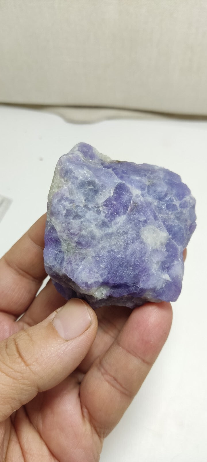 An amazing specimen of hackmanite highly Tenebrescent 143 grams