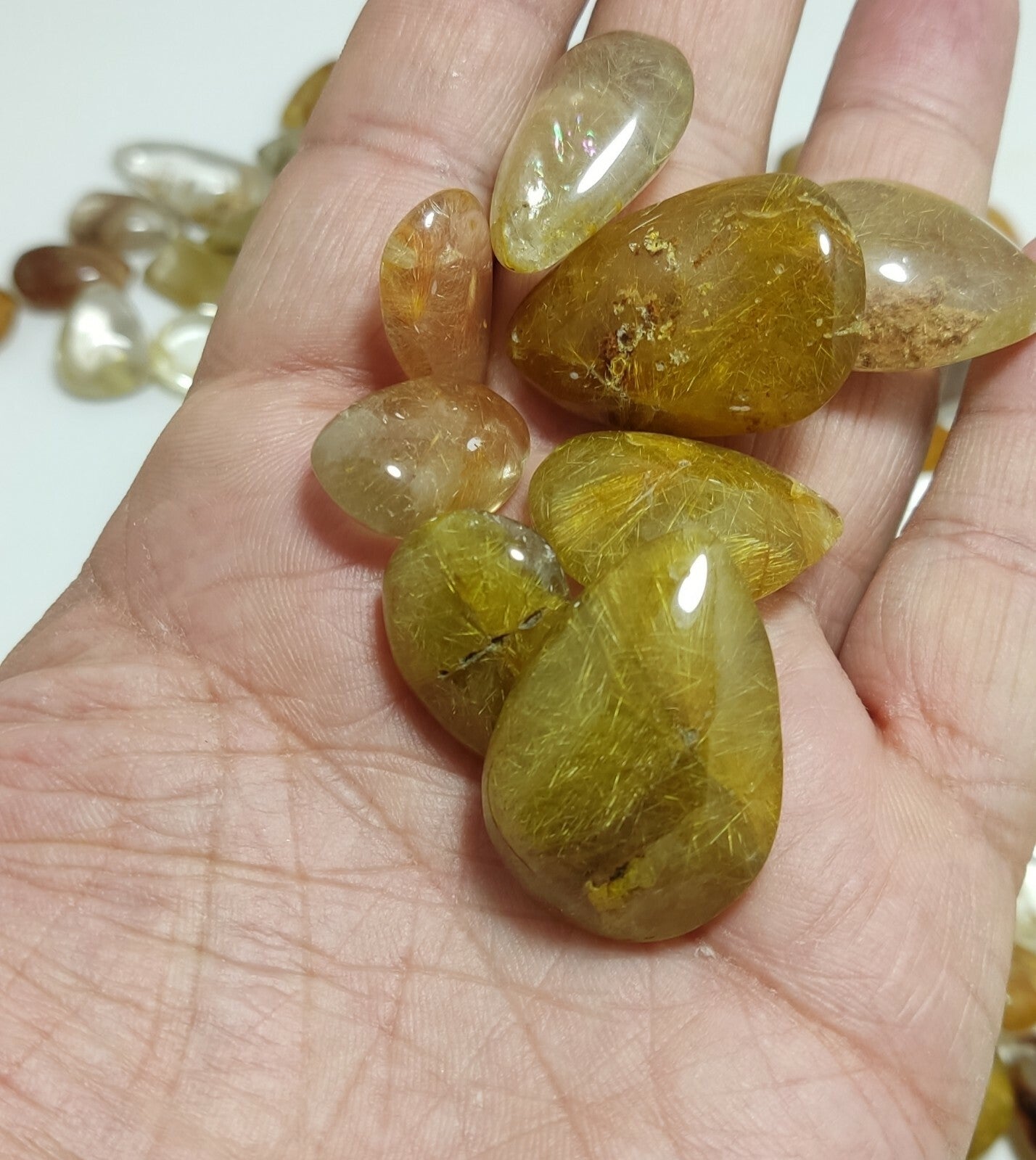 780 grams Rutilated polished quartz tumbles-cabochons