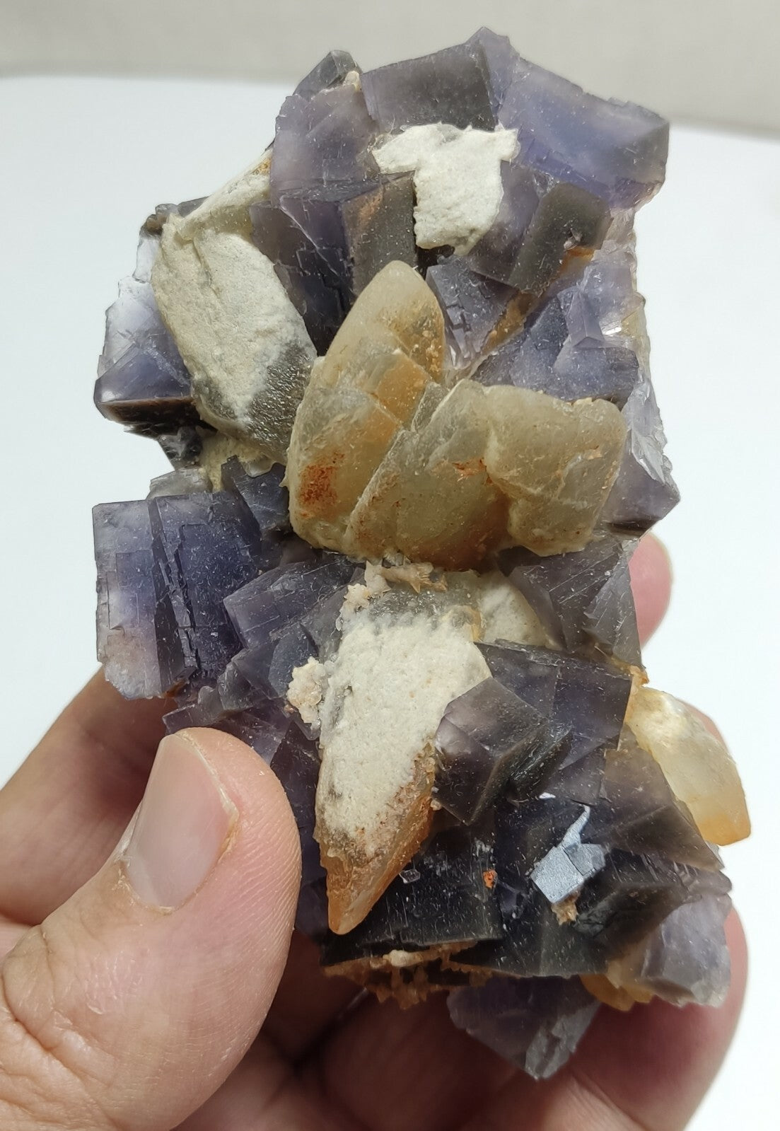 An amazing specimen of cubic purplish color Fluorite with calcite 263 grams