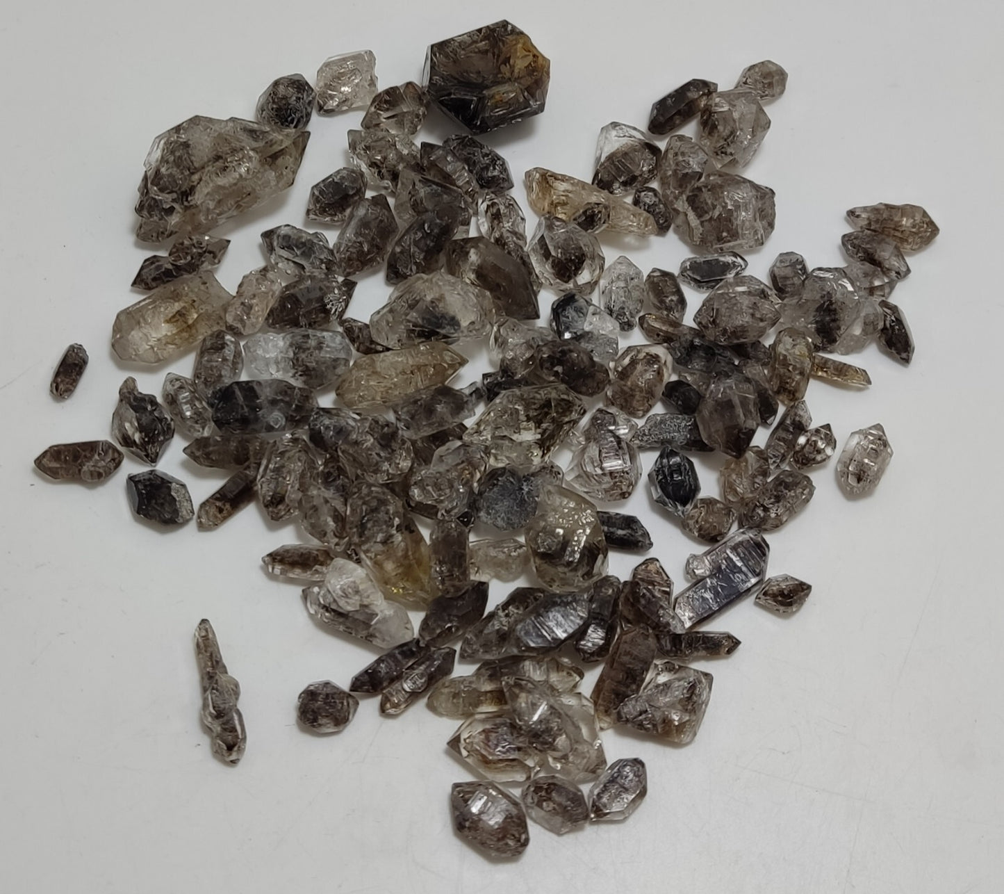 105 grams carbon included quartz crystals