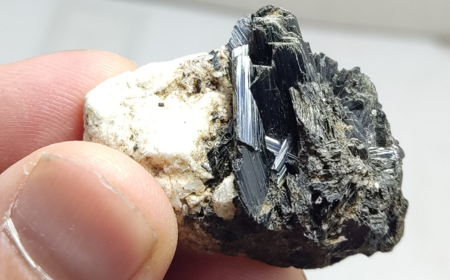 An aesthetic specimen of terminated aegirine crystals on matrix 25 grams