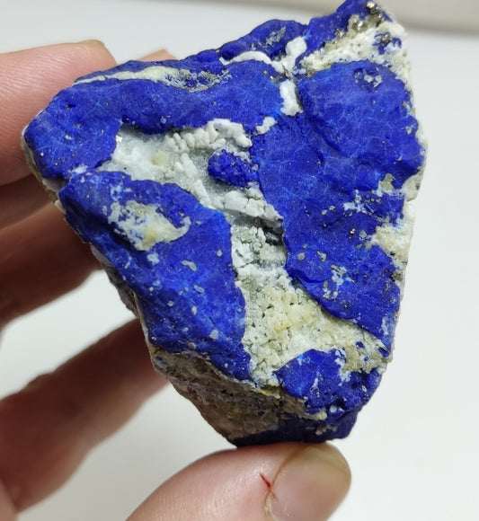 An Aesthetic specimen of fluorescent Lazurite with Pyrite 296 grams