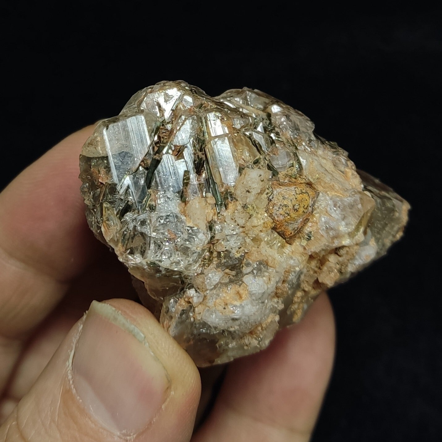 An Aesthetic terminated Quartz floater with aegirine inclusions 98 grams