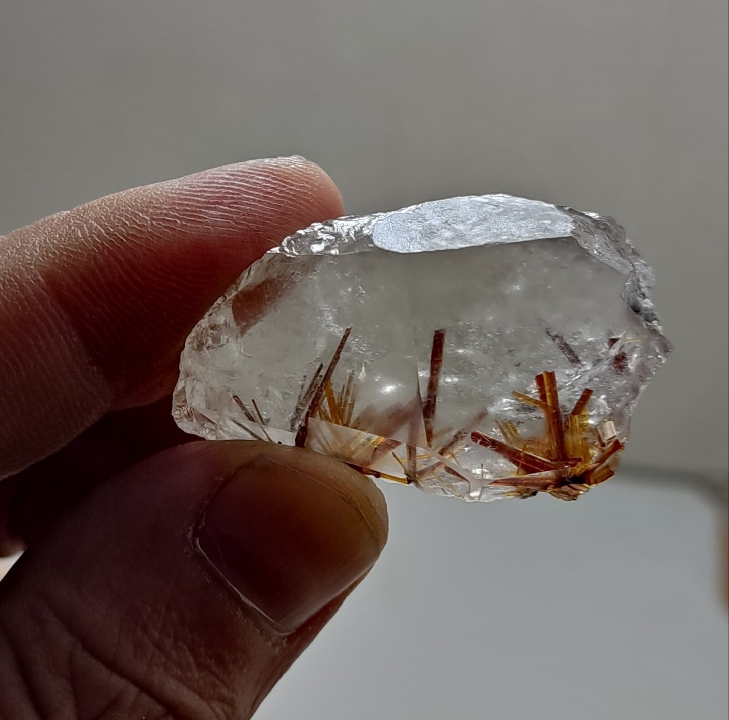 An aesthetic specimen of quartz with rutile inclusions 25 grams