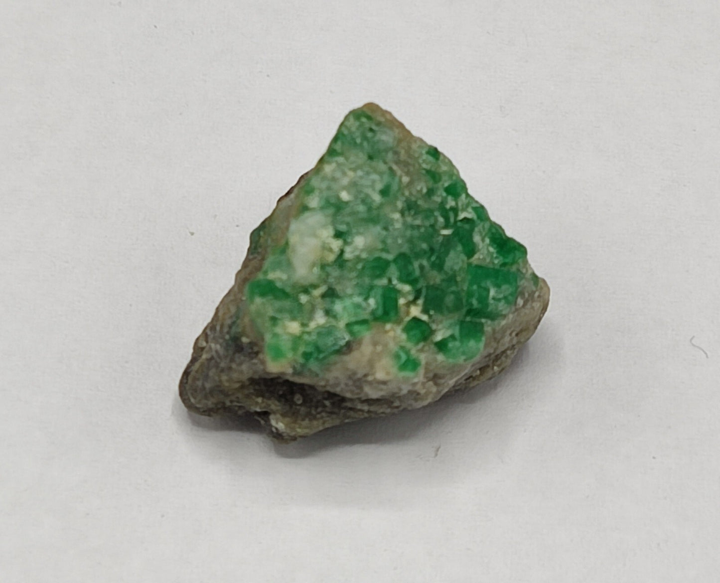 An Aesthetic miniature specimen of emerald in matrix 6.5 grams