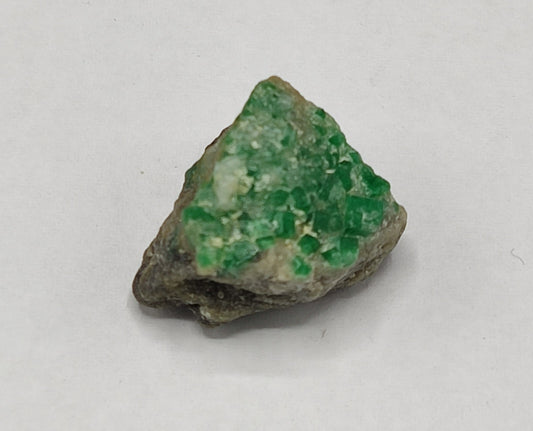 An Aesthetic miniature specimen of emerald in matrix 6.5 grams
