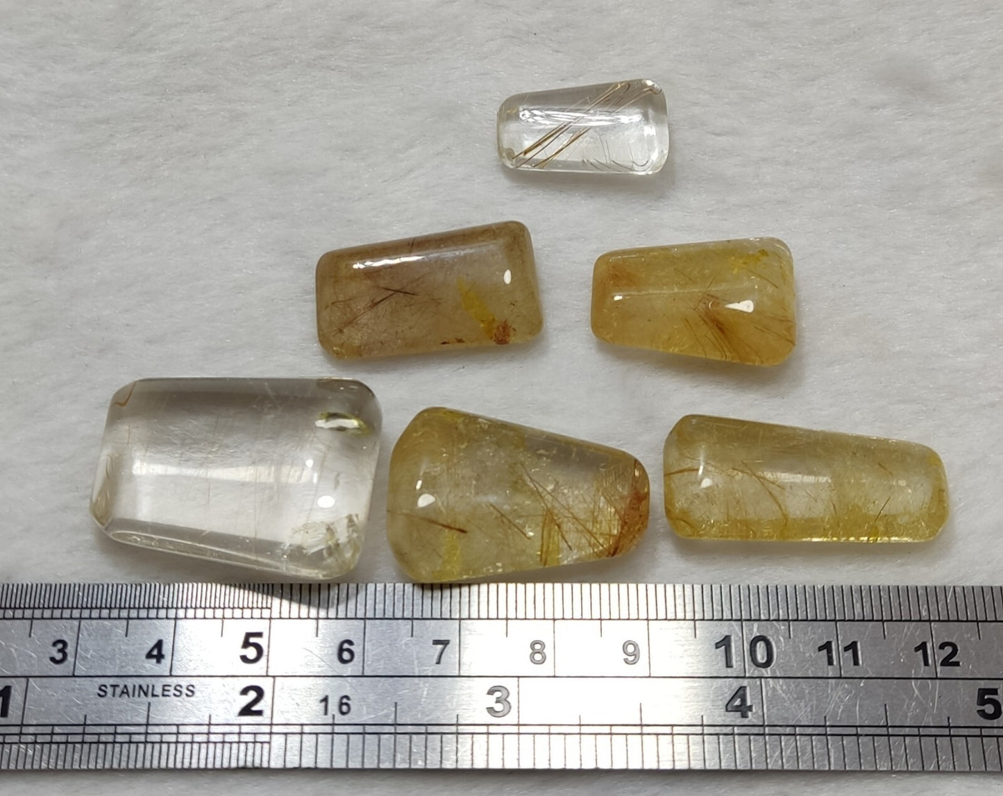 An amazing lot of Rutilated polished quartz tumbles 44 grams