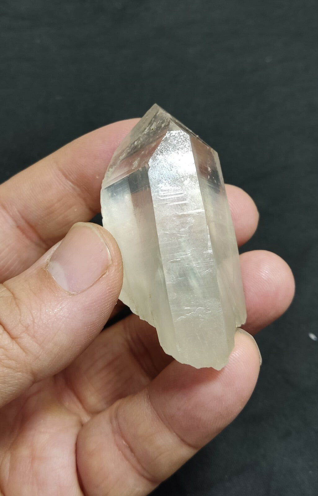An amazing specimen of terminated Quartz crystal with unique inclusions 67 grams