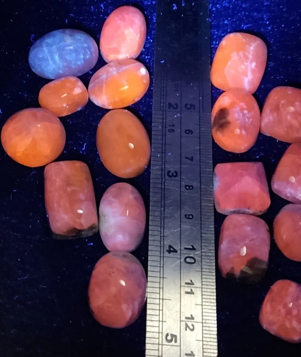 17 pieces Hackmanite cabochons  fluorescent collective weight 350 carats