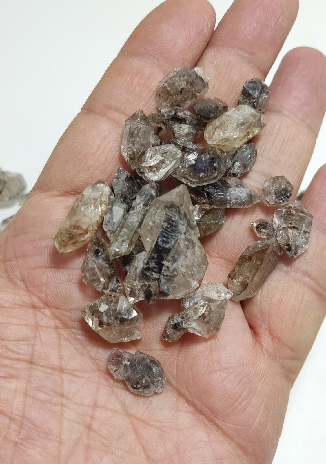 105 grams carbon included quartz crystals
