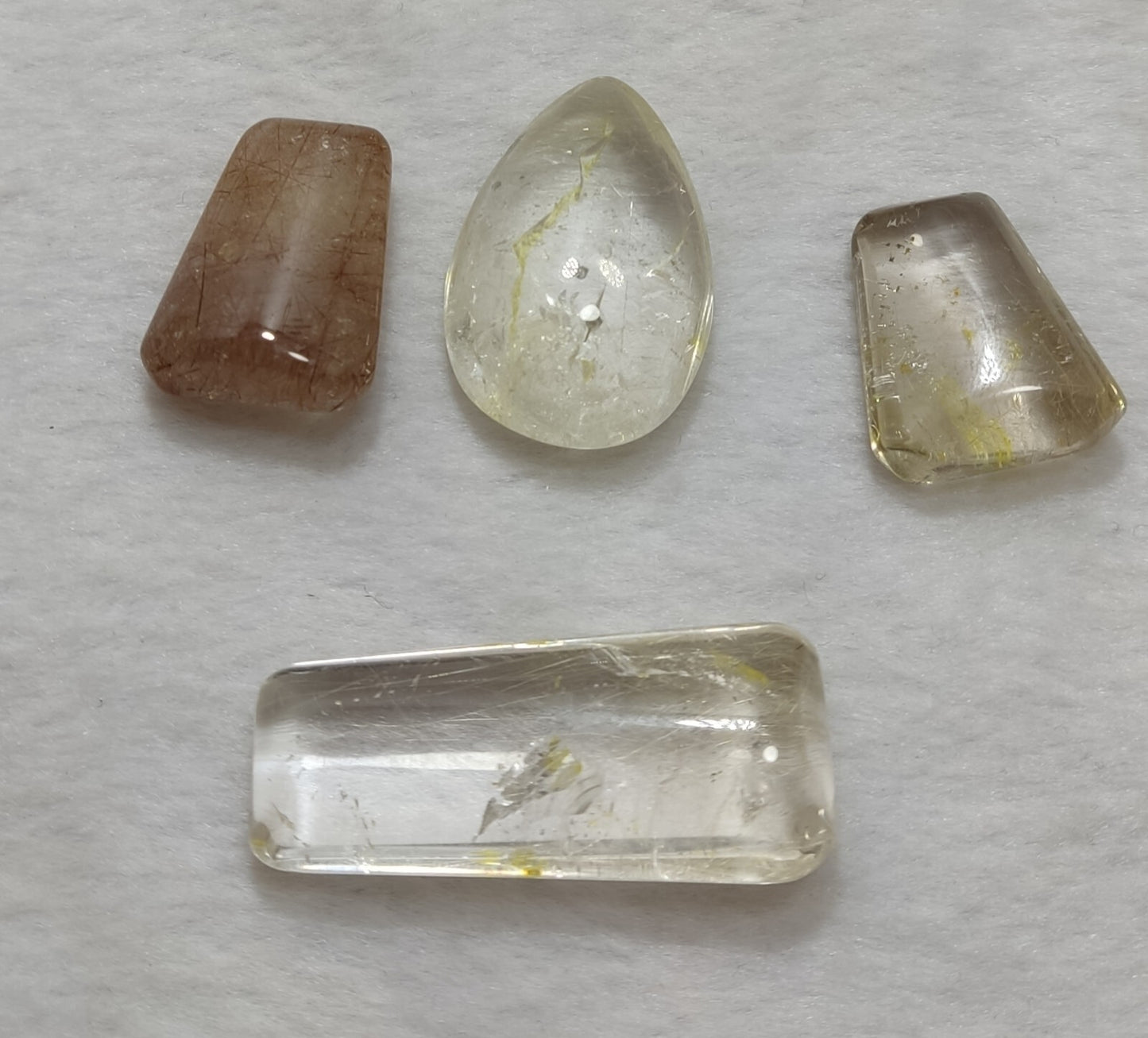 An amazing lot of Rutilated polished quartz tumbles 51 grams