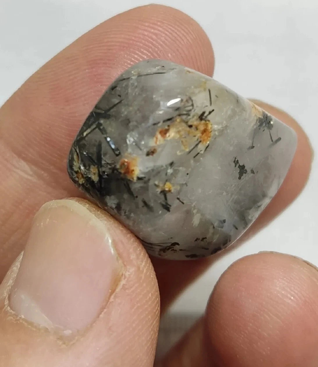 Rutiles/aegirine/ Unconfirmed quartz polished tumble 75 carats