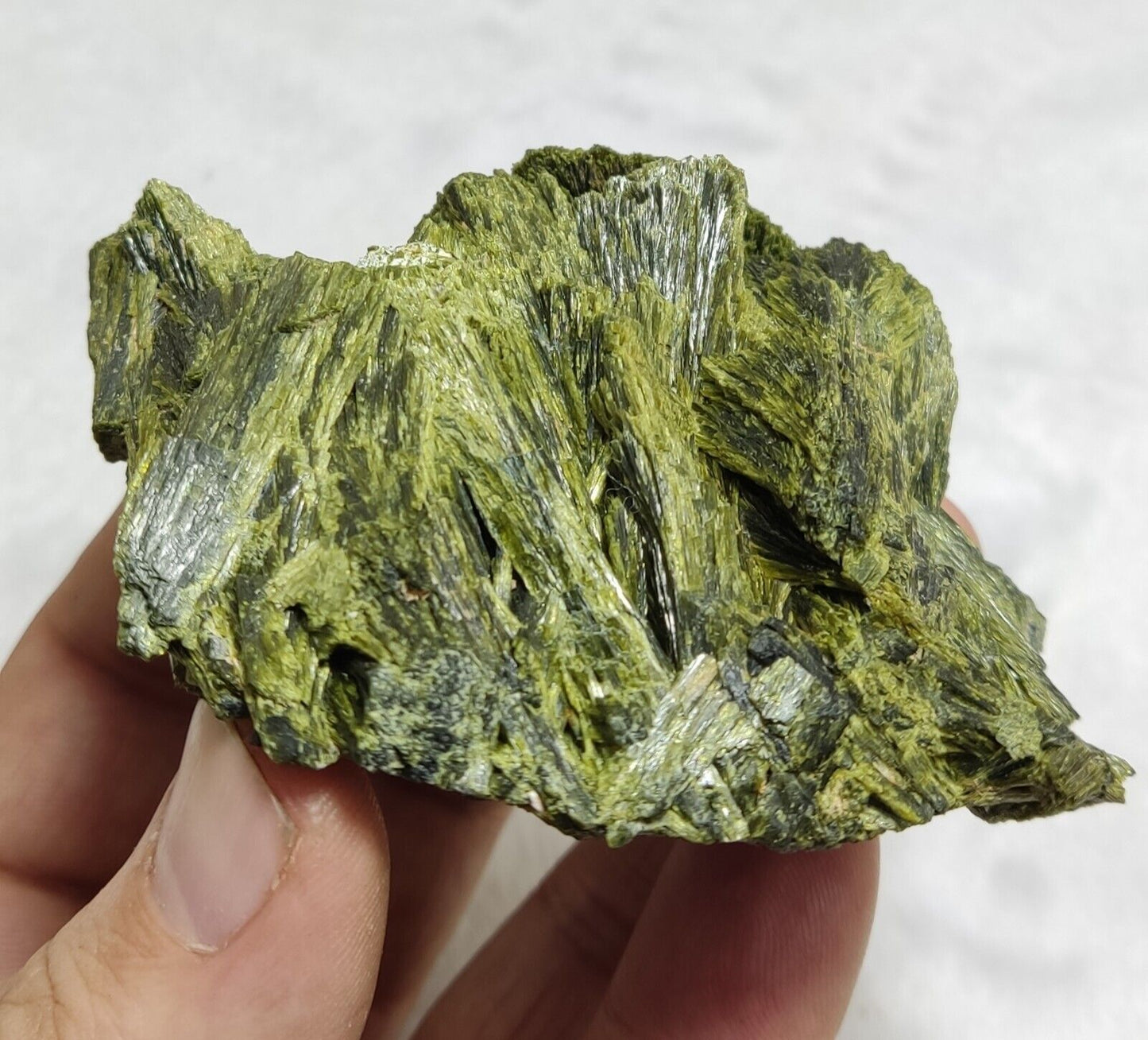 An aesthetic specimen of epidote crystal cluster 208 grams