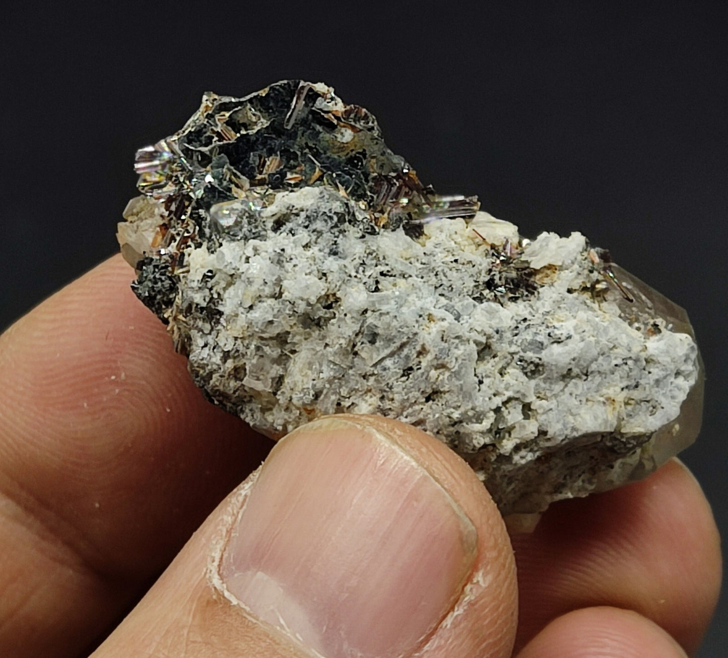 An Aesthetic specimen of quartz crystal with hematite and saginite 16 grams