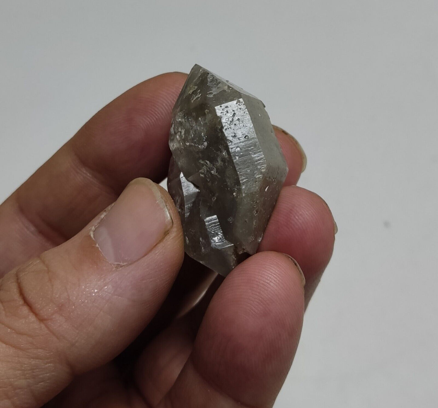 An aesthetic crystyof lodolite/chlorite Quartz 24 grams