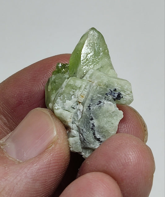 A aesthetic naturally terminated peridot crystal specimen 12 grams