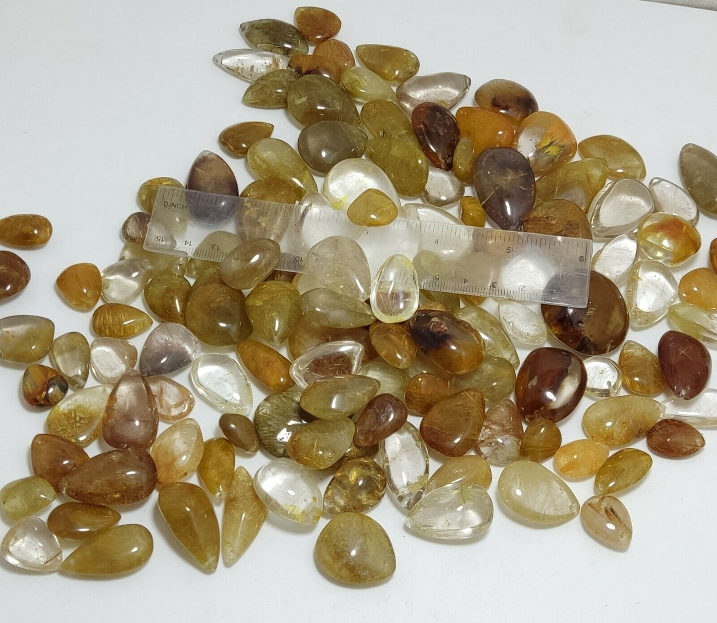 780 grams Rutilated polished quartz tumbles-cabochons