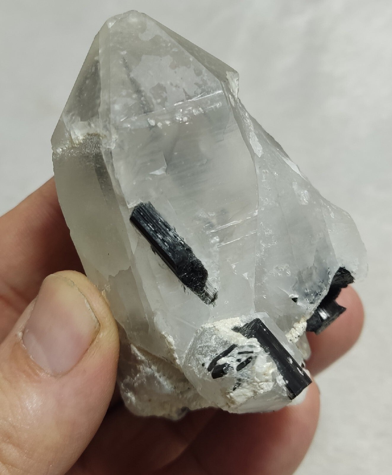 Natural quartz crystal with black tourmaline 145 grams