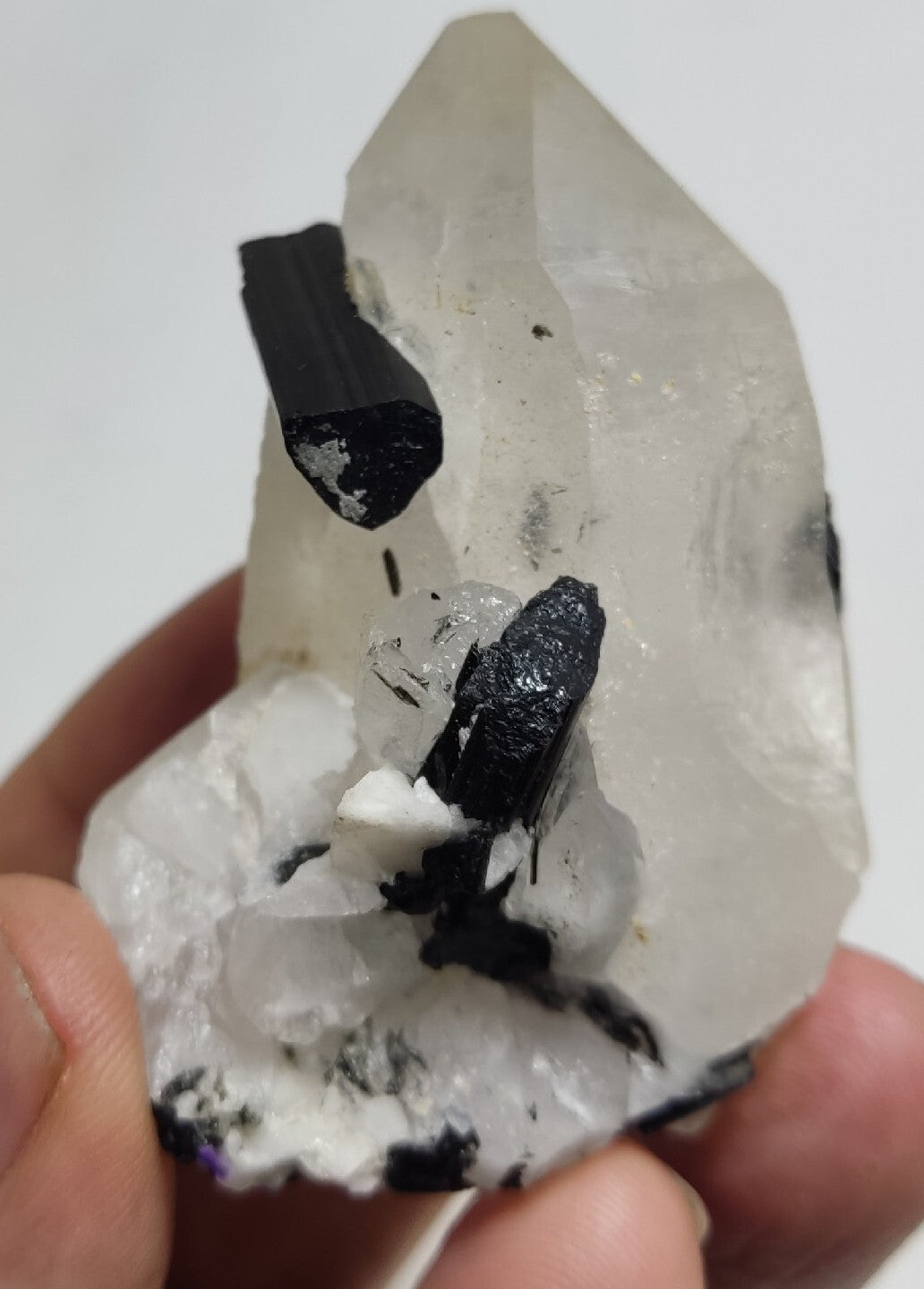Natural quartz crystal with black tourmaline 126 grams