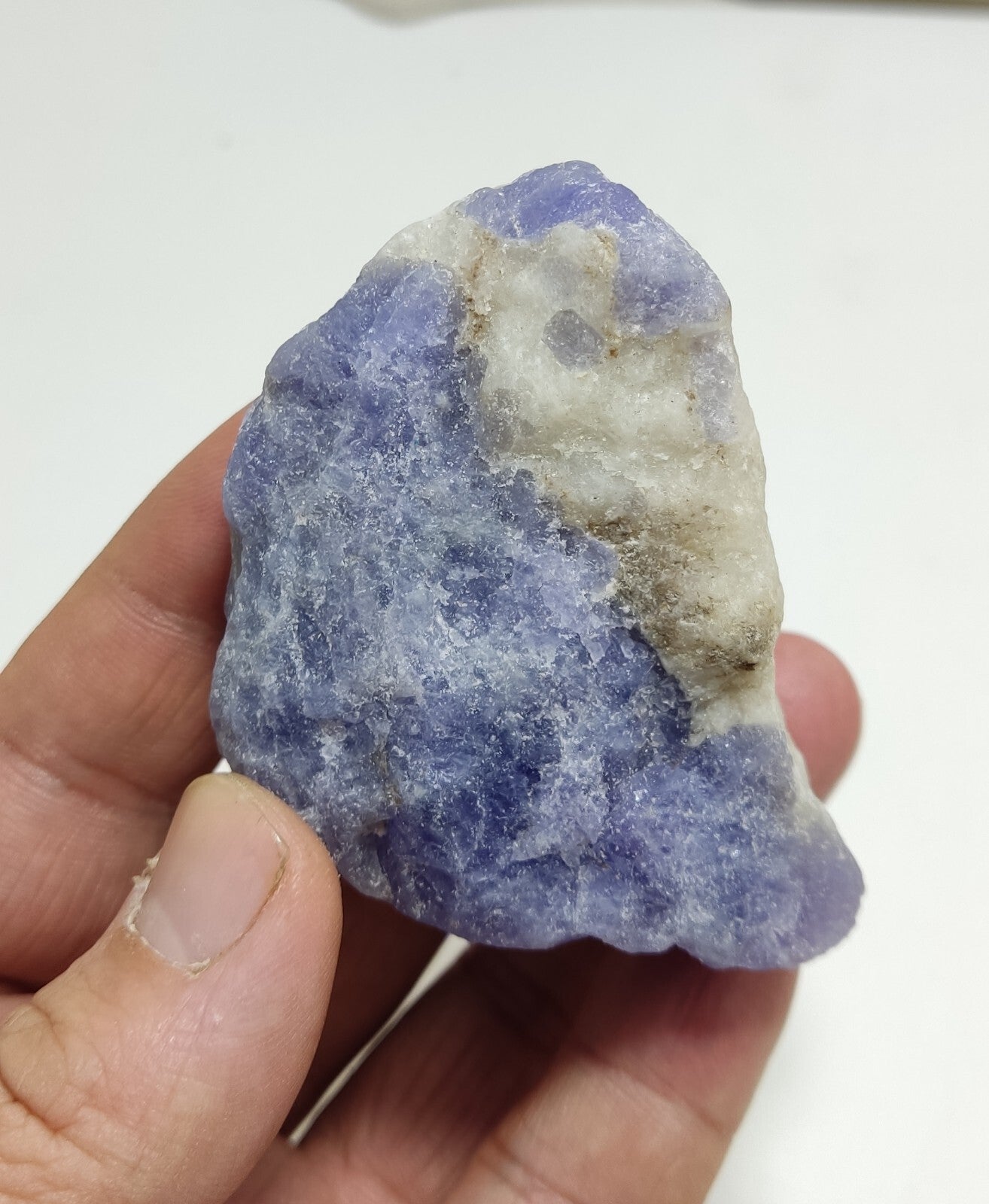 An amazing specimen of hackmanite highly Tenebrescent 124 grams