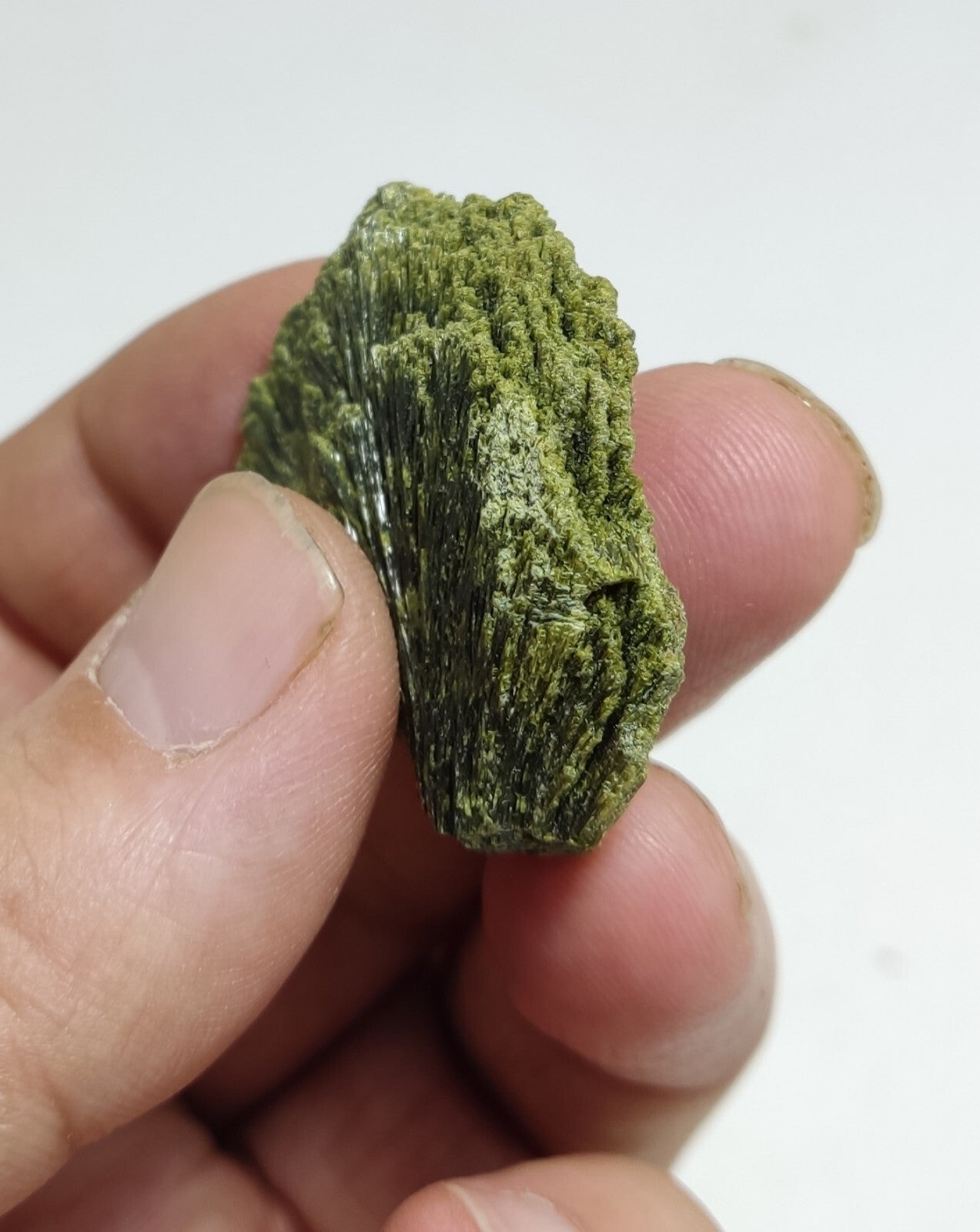 An aesthetic specimen of epidote crystal spray type 22 grams