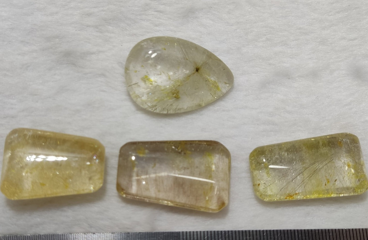 An amazing lot of Rutilated polished quartz tumbles 45 grams