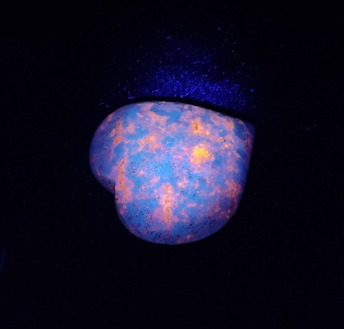 An amazing specimen of polished Hackmanite heart shape 183 grams