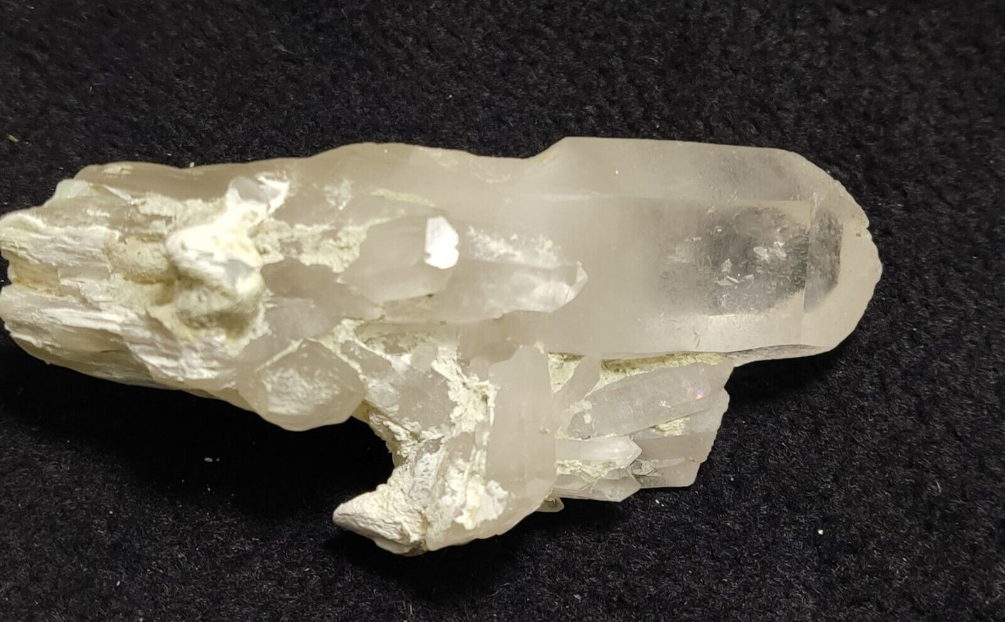 Aesthetic specimen of quartz crystal with unique amphibole inclusion 101 grams
