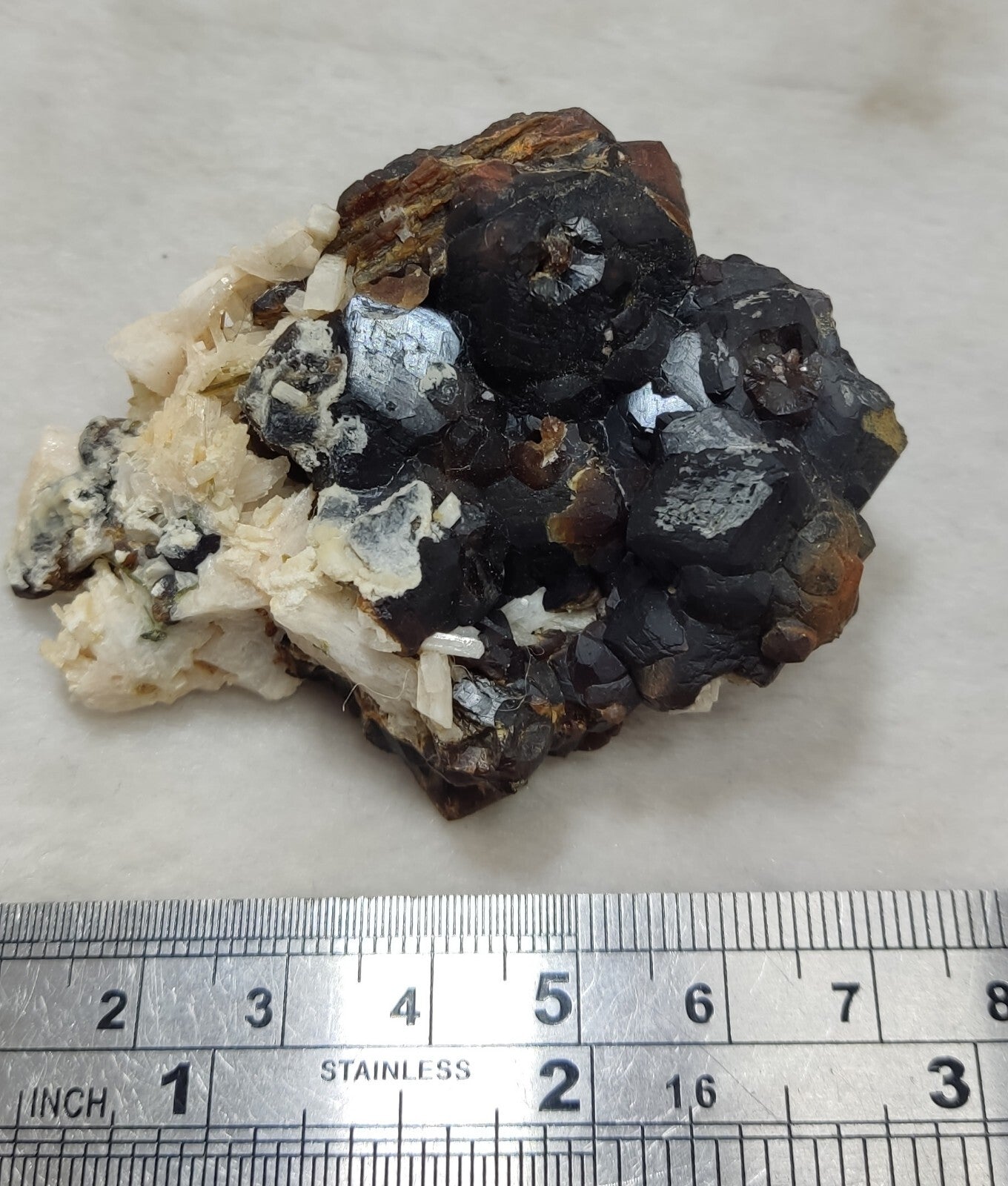 An Aesthetic specimen of andradite garnets on matrix 120 grams