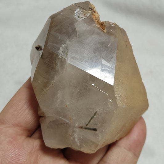 An Aesthetic terminated Quartz floater with needle inclusions 265 grams