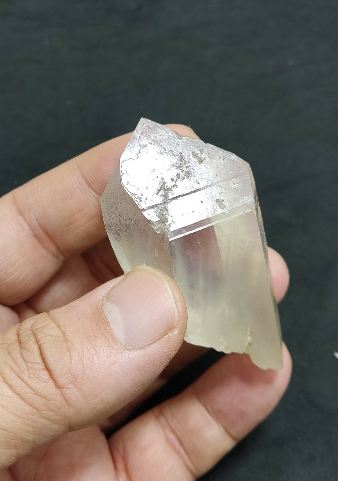 An amazing specimen of terminated Quartz crystal with unique inclusions 67 grams