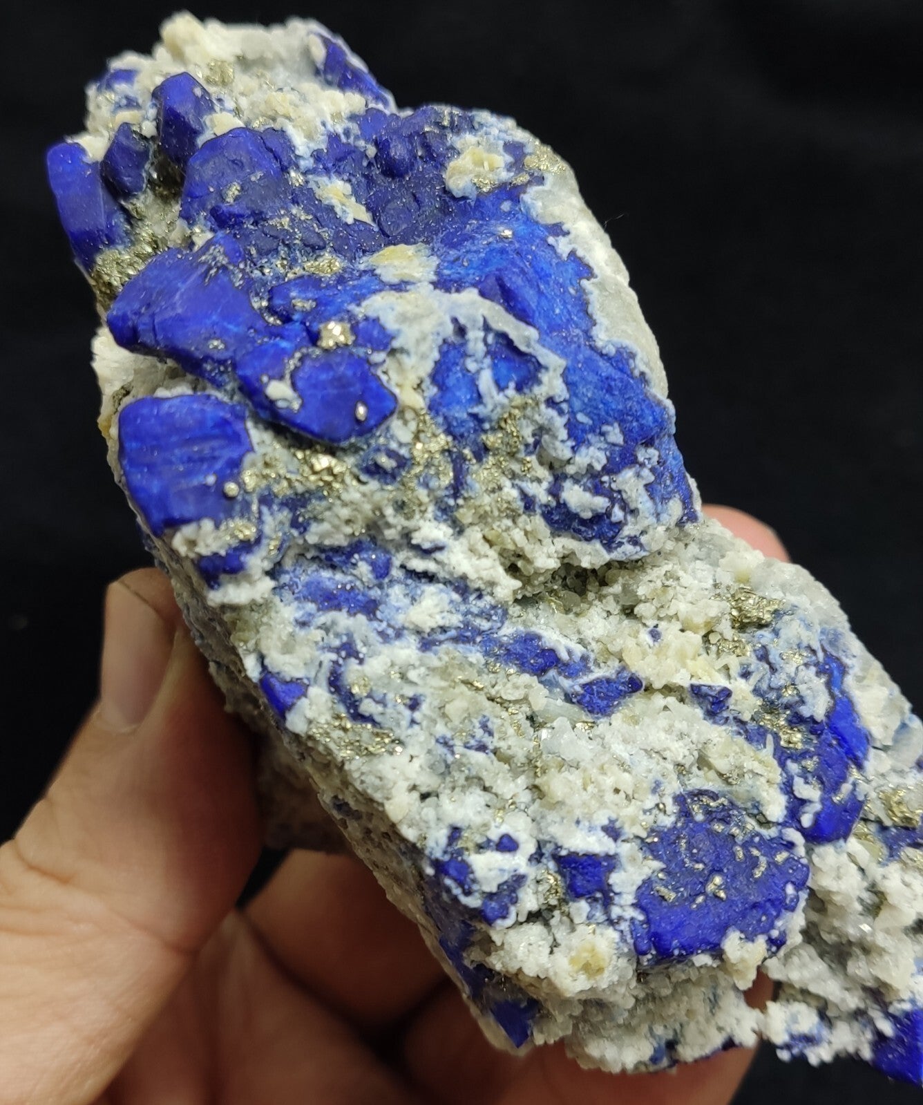 An Aesthetic specimen of fluorescent Lazurite with pyrite 489 grams