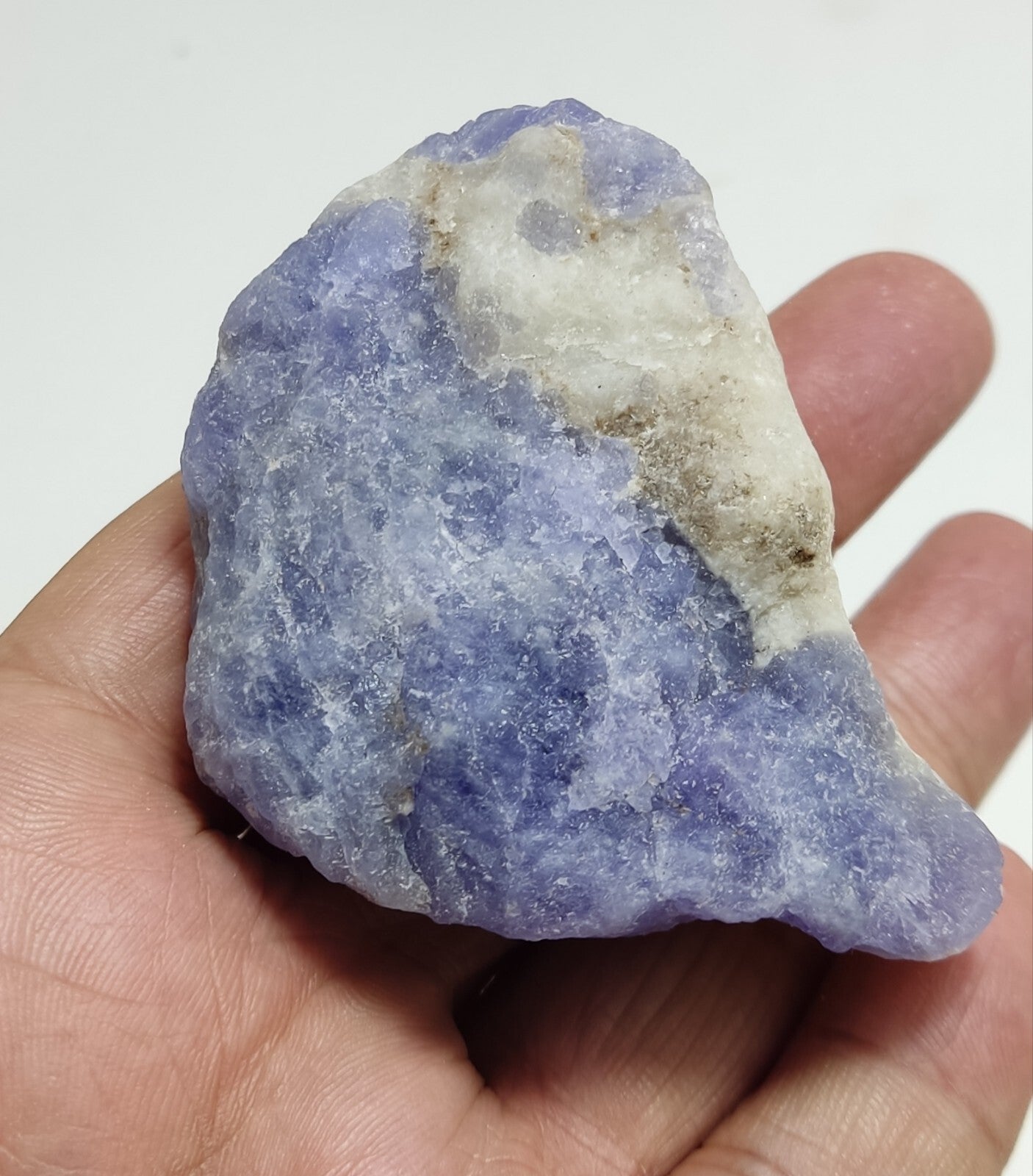 An amazing specimen of hackmanite highly Tenebrescent 124 grams