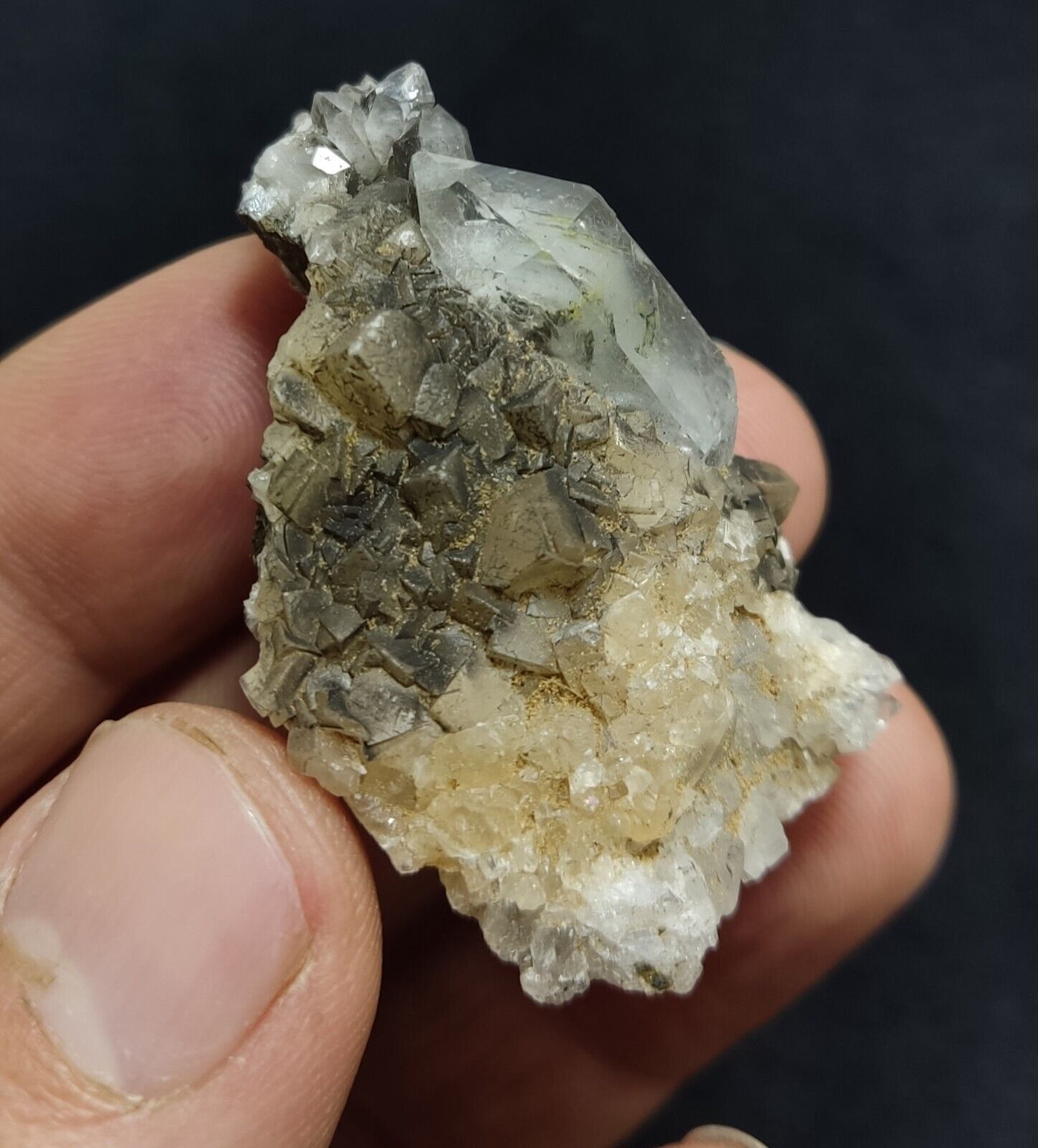 An Aesthetic quartz/calcite crystal specimen with petroleum inclusions 23 grams